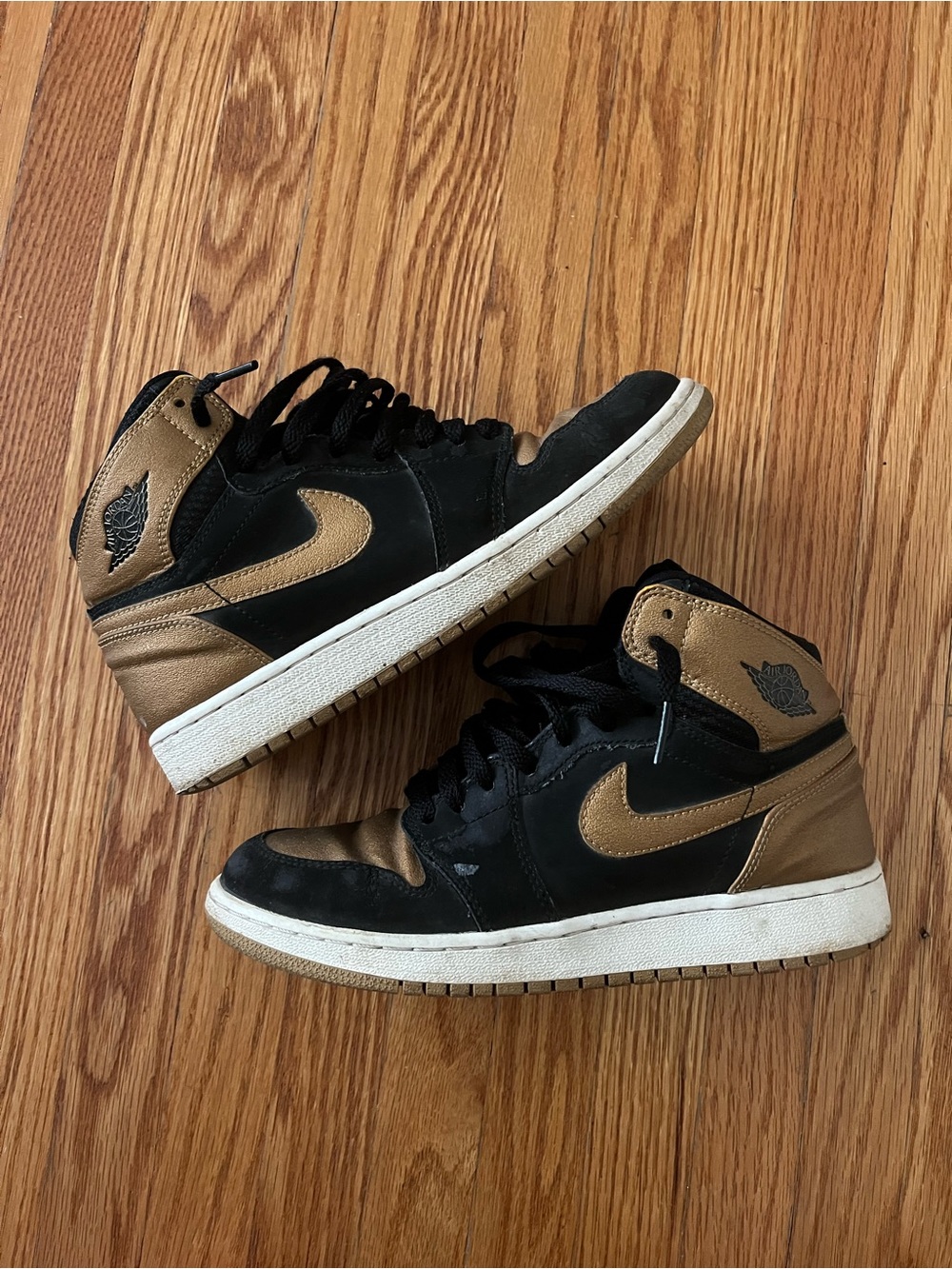 Youth Gold and Black Jordan 1 Mid